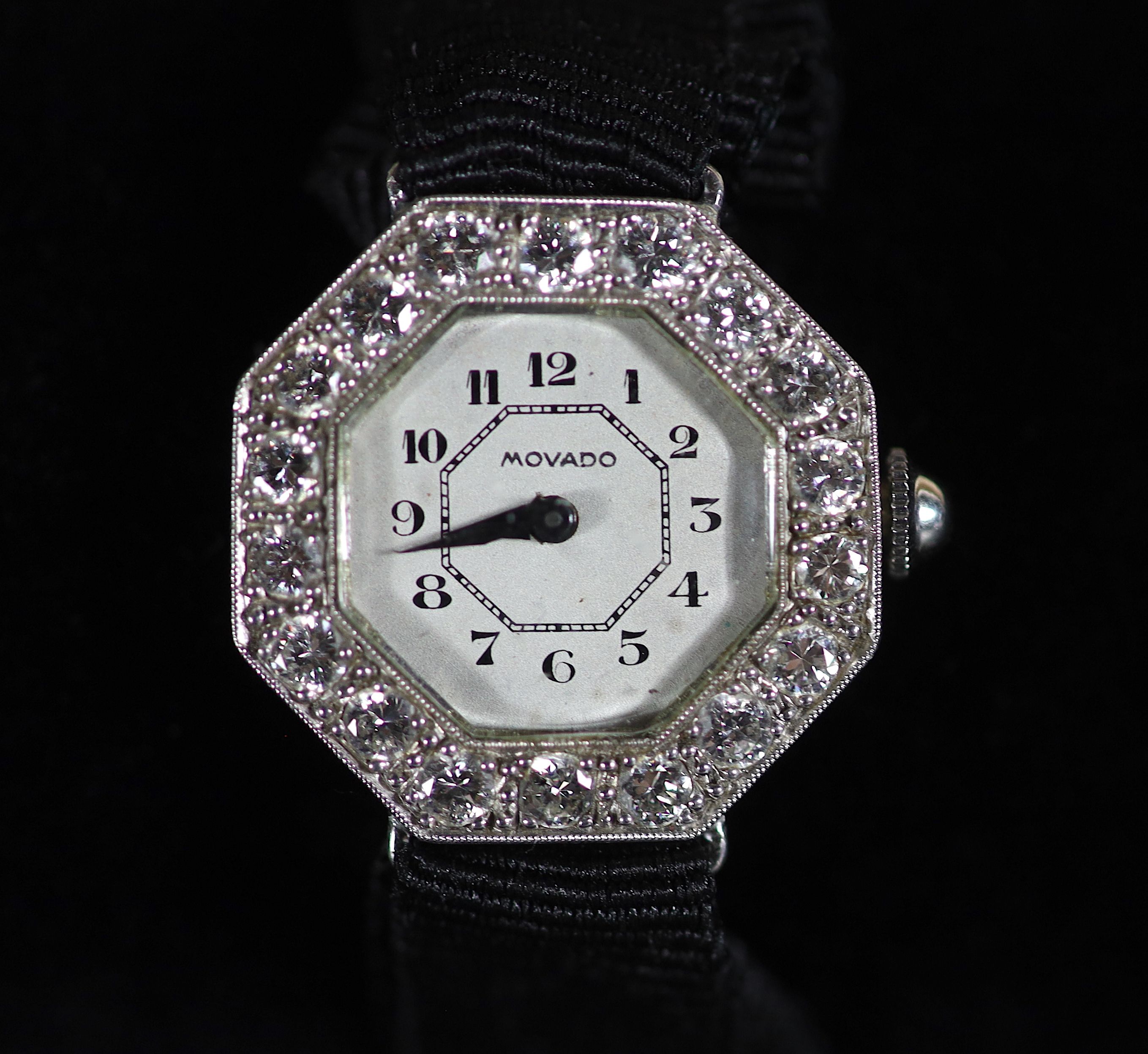 A 1930's/1940's platinum and diamond set Movado octagonal manual wind cocktail watch